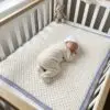 Handmade White Crochet Baby Blanket with Blue Edge – Soft & Elegant Design
