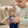 Teddy bear with blue shirt