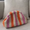 Raffia striped clutch