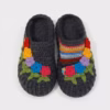 grey flowered crocs with striped colors